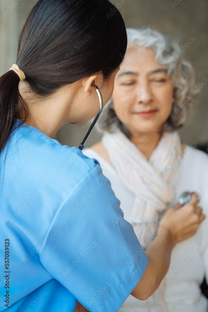 Doctor with stethoscope examining elderly patient with examination, presenting symptoms and recommending treatment, healthcare and medical concept. Doctor with stethoscope examining elderly patient with examination, presenting symptoms and recommending treatment, healthcare and medical concept.