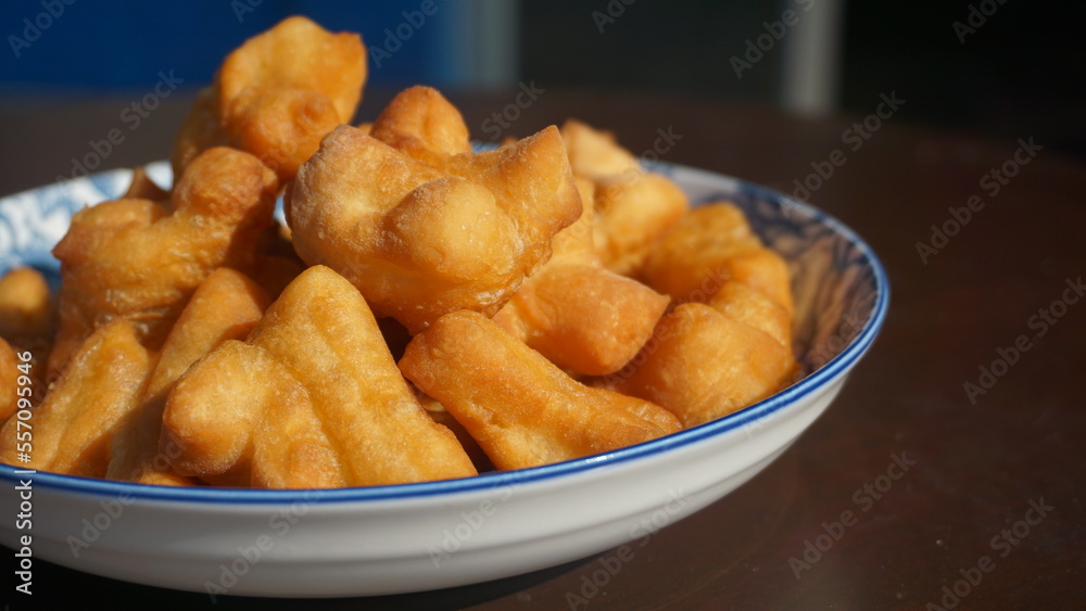 Chinese Bread Stick, The breakfast made from fried flour is called Patongo on plate. Chinese Bread Stick, The breakfast made from fried flour is called Patongo on plate.