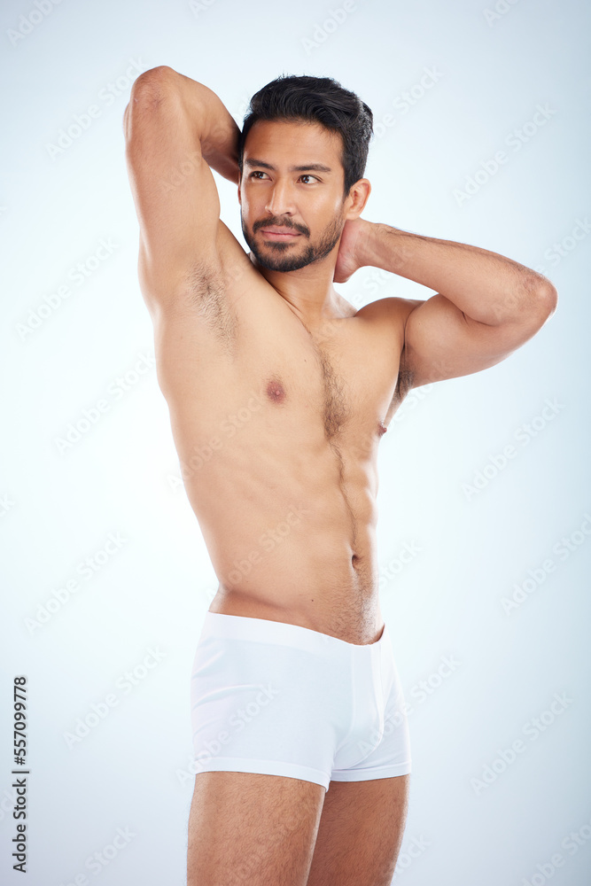 Fototapeta premium Fitness, underwear or man in studio for training, body exercise or bodybuilding workout for wellness. White background, motivation or healthy male model body builder with muscle development or goals