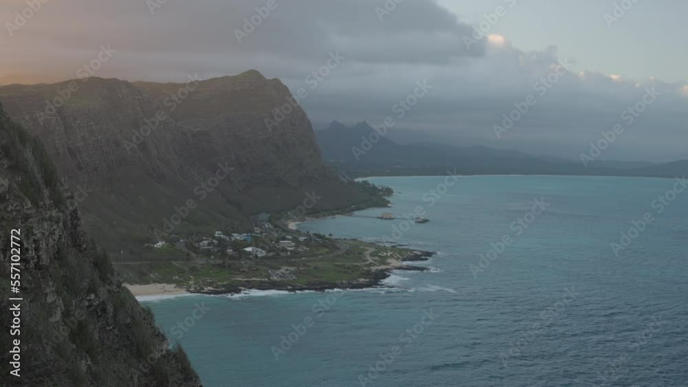 Green Mountain at sunset time with the sky and the ocean Green Mountain at sunset time with the sky and the ocean