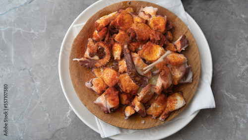 A dish with appetizingly fried pieces of octopus.