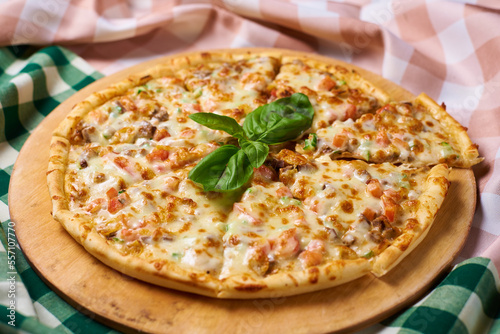 italian pizza with minced meat and mushrooms