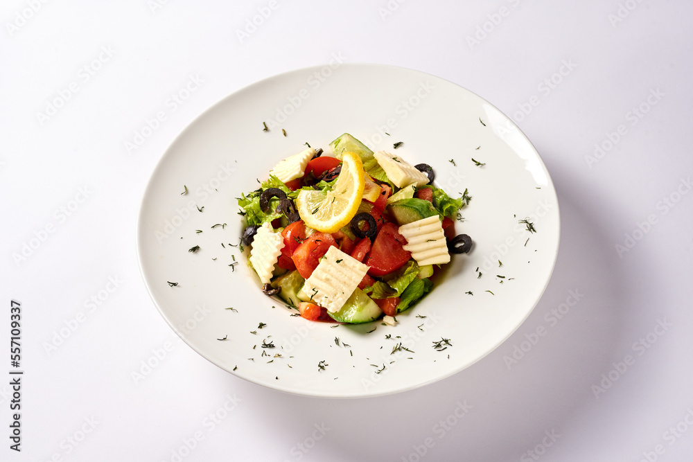 greek salad. on a white background greek salad. on a white background