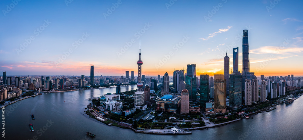 Fototapeta premium Aerial view of city skyline and modern buildings in Shanghai at sunrise, China.