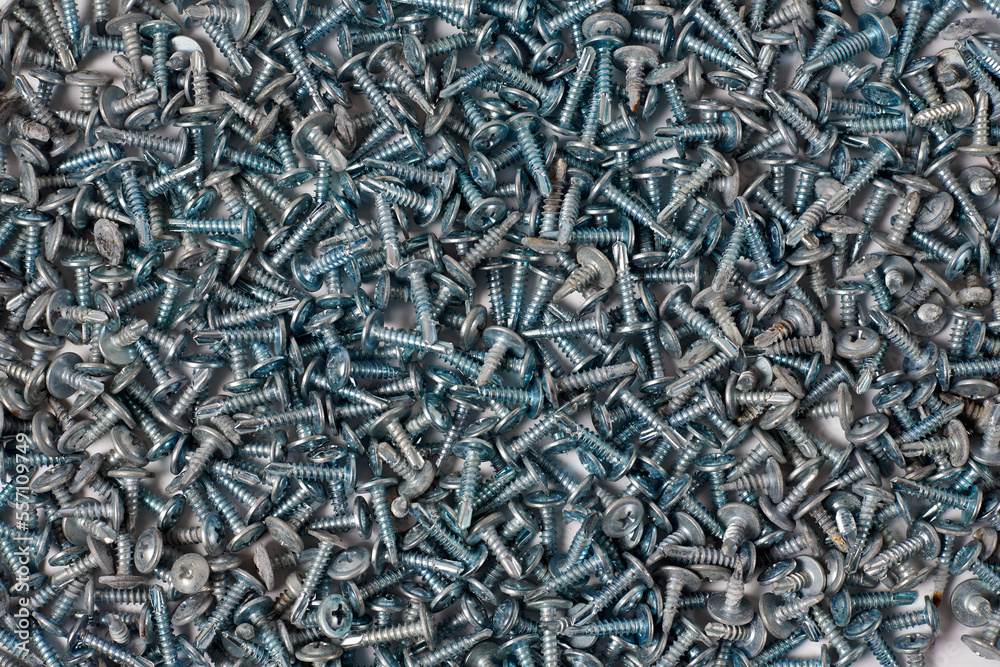 steel self-tapping screws used in handicrafts background texture, top view steel self-tapping screws used in handicrafts background texture, top view