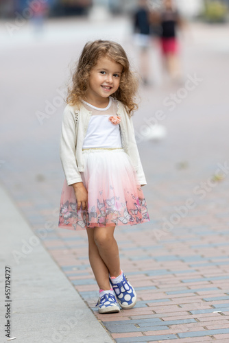 Cute little girl posing and smiling © dechevm