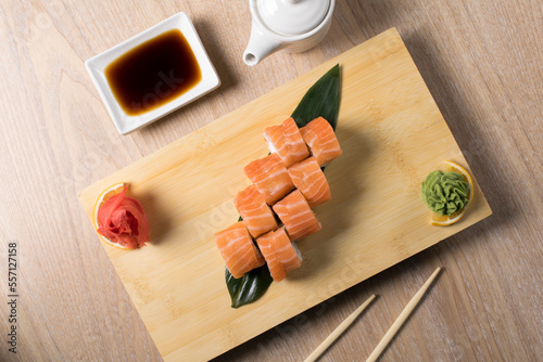 japanese sushi, rolls on a wooden board