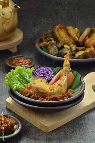 Fried Chicken, Served with vegetable and Sambal. Indonesian Popular Dish, Ayam Goreng.