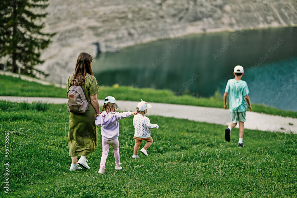 Fototapeta premium Mother with kids at Vorderer Gosausee, Gosau, Upper Austria.