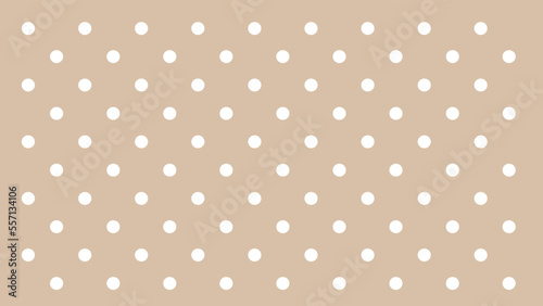 beige background with white polka dots
