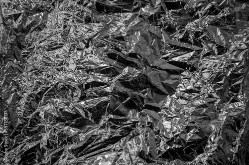 black crumpled metal foil background image