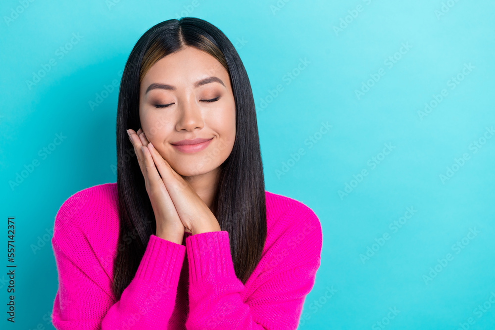 Photo of tender cute dreamy lady wear pink trendy clothes arms under head relax rext empty space isolated on cyan color background