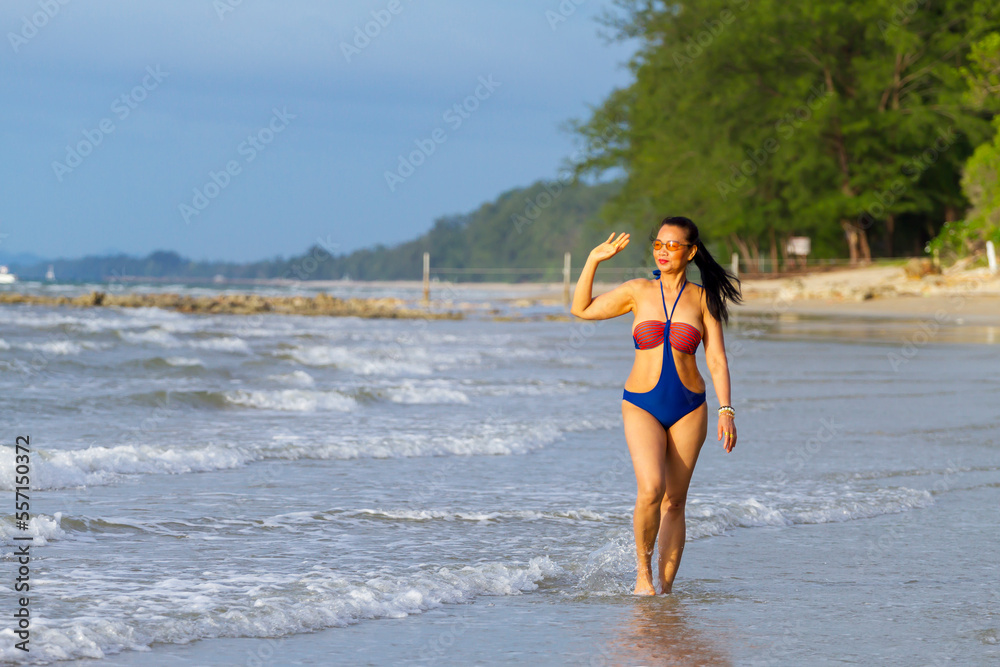 Woman body big sexy with swimsuit at beach
