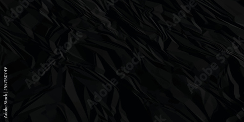 Black paper texture . Dark black wrinkled paper texture. Black crumpled paper texture . Black crumpled and top view textures can be used for background of text or any contents . closeup fabric .