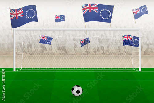 Cook Islands football team fans with flags of Cook Islands cheering on stadium, penalty kick concept in a soccer match.
