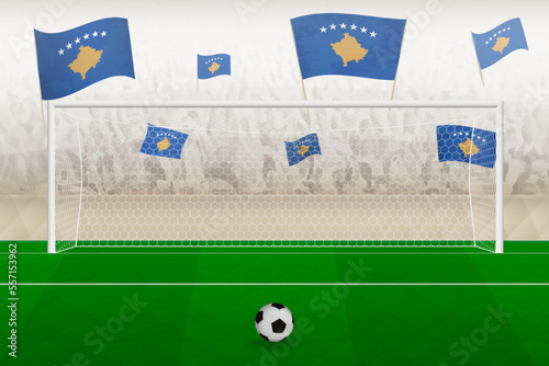 Kosovo football team fans with flags of Kosovo cheering on stadium, penalty kick concept in a soccer match.