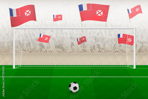 Wallis and Futuna football team fans with flags of Wallis and Futuna cheering on stadium, penalty kick concept in a soccer match.