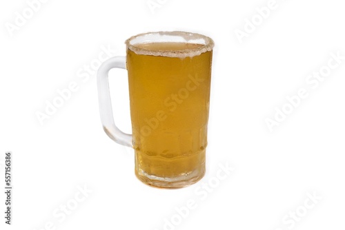 Mexican drink orange beer with salt isolated on white background