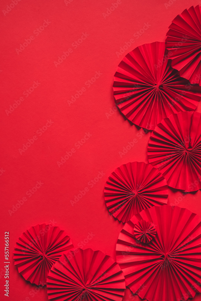 Obraz premium Chinese New Year 2023 .Decor pattern fan on red background. Red paper fans .Lunar New Year banner template. Lunar New Year,chinese banner,chinese new year background