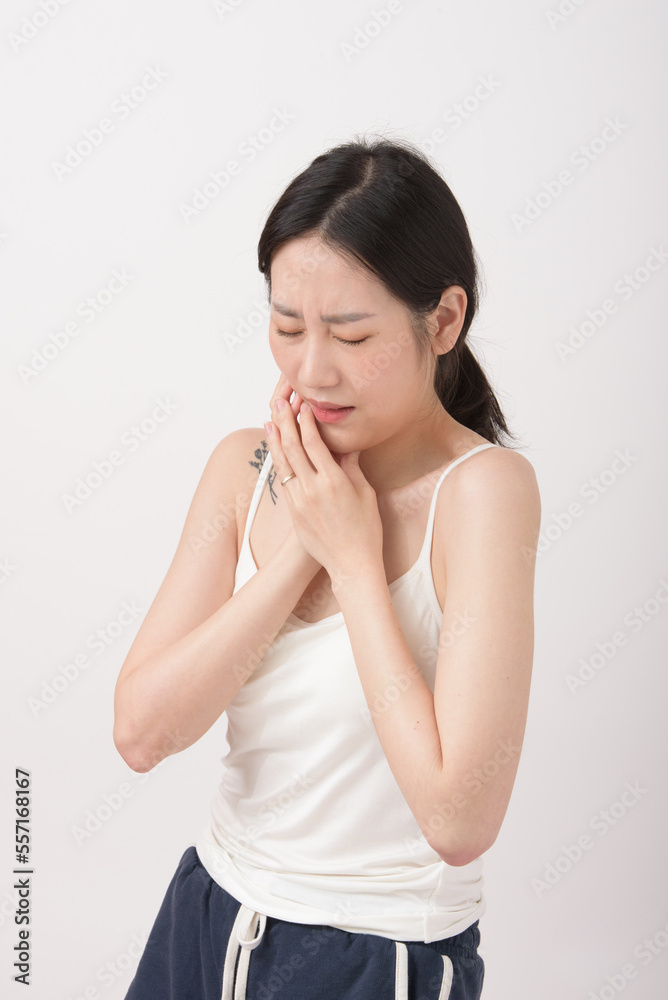 adult woman feels sick, while standing and suffering from unbearable pain. adult woman feels sick, while standing and suffering from unbearable pain.