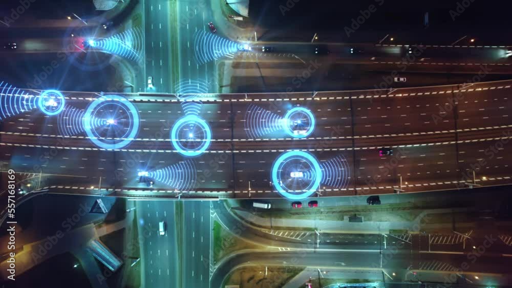 Smart city of the future at night. View from above at self driving cars on a road intersection. Autonomous driving systems, control vehicles through artificial intelligence. Animation of road scanning Smart city of the future at night. View from above at self driving cars on a road intersection. Autonomous driving systems, control vehicles through artificial intelligence. Animation of road scanning