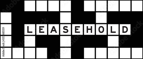 Alphabet letter in word leasehold on crossword puzzle background