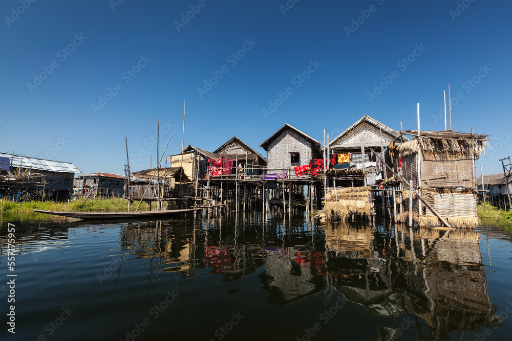 Stilted houses in village on Inle lake, Myanmar. Tourist attraction Stilted houses in village on Inle lake, Myanmar. Tourist attraction