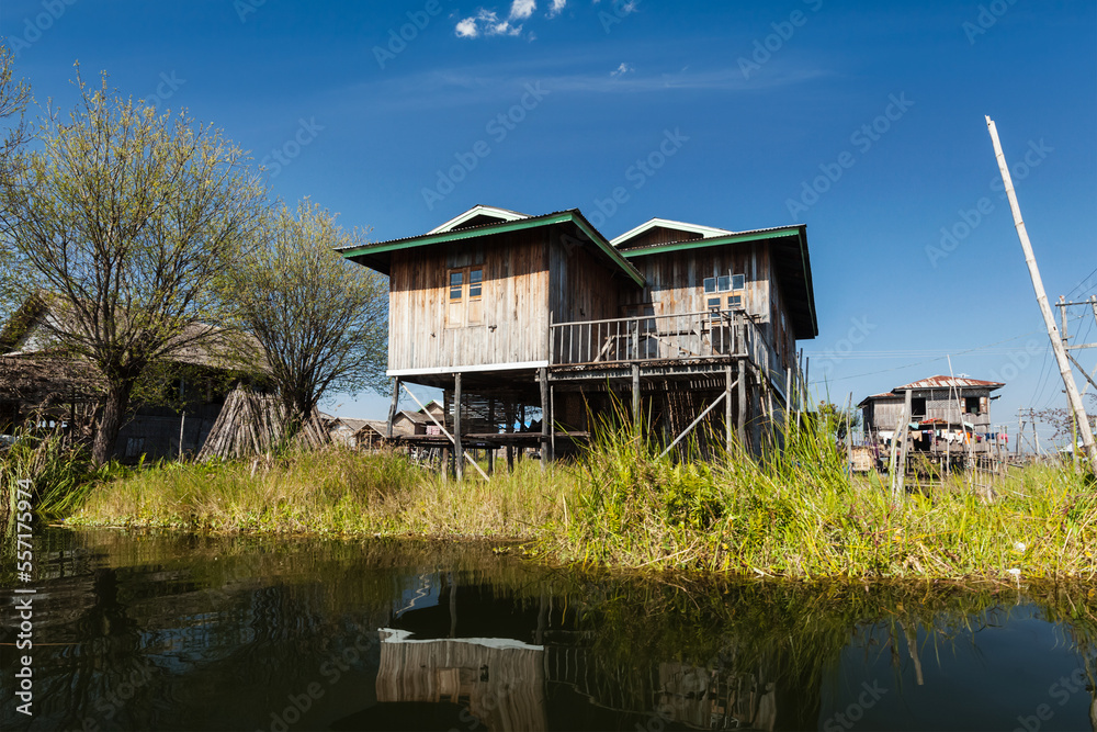 Stilted houses in village on Inle lake, Myanmar. Tourist attraction Stilted houses in village on Inle lake, Myanmar. Tourist attraction