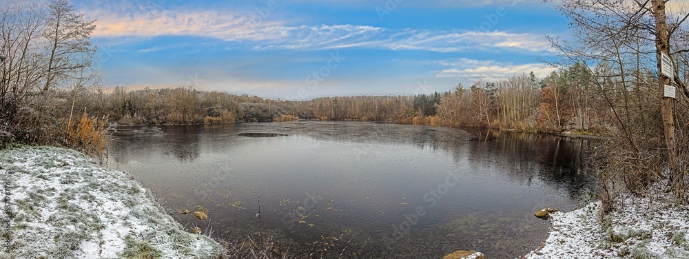 View of the ice surface of the draught frozen lake Oberwaldsee during the day