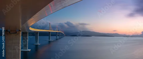 Obraz  z motywem Peljesac Bridge, Croatia. Panoramic image of beautiful modern multi-span cable-stayed Peljesac Bridge over the sea in Dubrovnik-Neretva County, Croatia at sunset. 