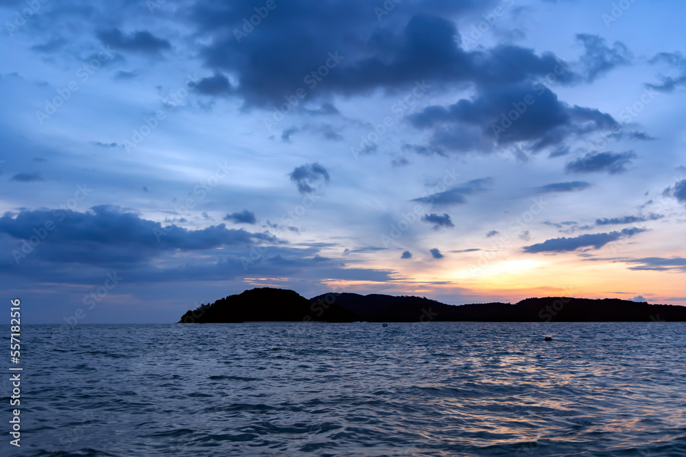Beautiful colorful sunset over the Langkawi island in Andaman sea, Malaysia. Desktop wallpaper. Nature. Travel concept.	