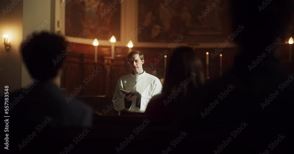 In Christian Church: Portrait of Minister Leading Congregation In Prayer, Reads From Holy Book, The Bible, Gospel of Jesus. Priest Providing Guidance, Belief, Hope, Faith to People. Cinematic Light In Christian Church: Portrait of Minister Leading Congregation In Prayer, Reads From Holy Book, The Bible, Gospel of Jesus. Priest Providing Guidance, Belief, Hope, Faith to People. Cinematic Light