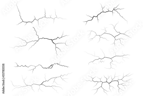 Cracks collection on wall, earth or stone. Scratches lines on surfaces. Lightning and thunderstorm vector illustrations. Fissure on ground and ice. Graphic explosions textures with holes.