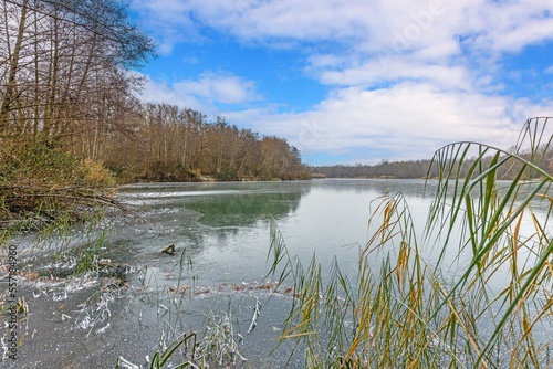 View of the ice surface of the draught frozen lake Oberwaldsee during the day