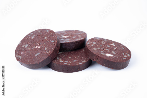 Thick slices of pork farmhouse black pudding isolated on a white background