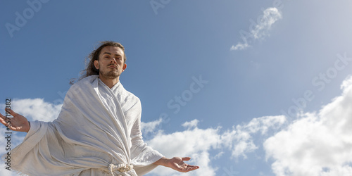Obraz na płótnie holy man (like Jesus) looks into camera with arms open and welcoming w salonie