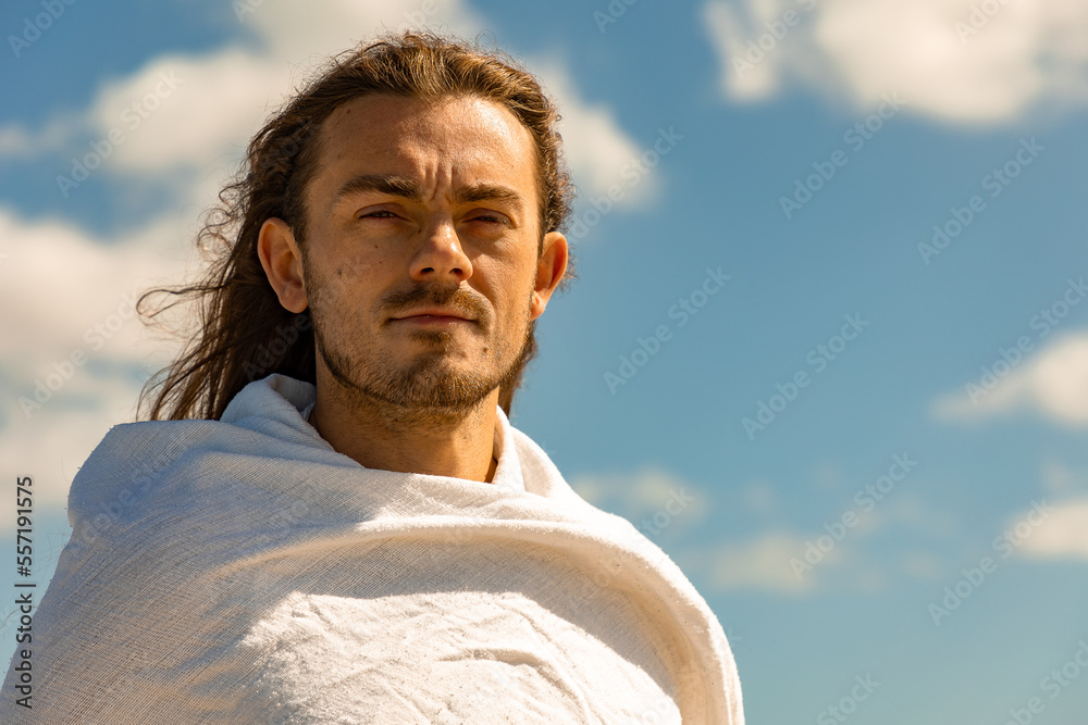 Portrait of a man in white robe who looks like Jesus Christ