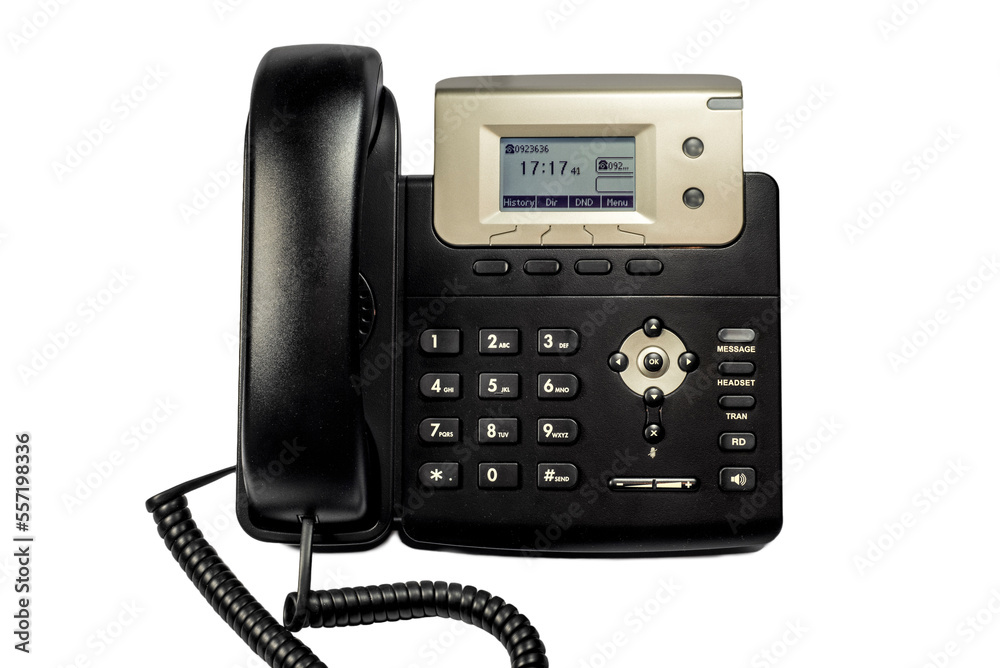 Black digital desktop IP telephone, close-up on white background Black digital desktop IP telephone, close-up on white background