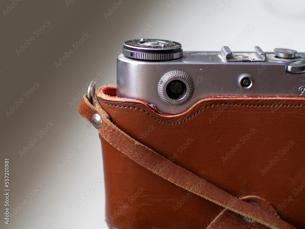 Vintage camera in leather case Stock Photo | Adobe Stock