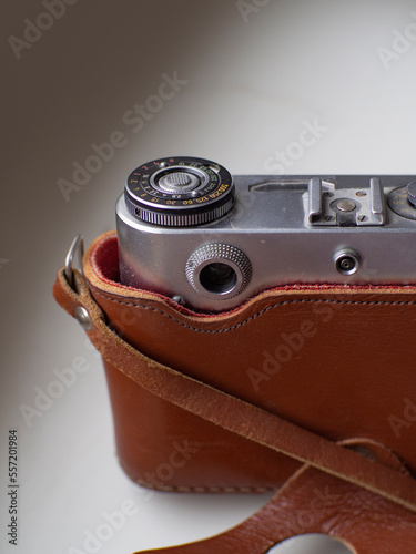 Vintage camera in leather case vertical