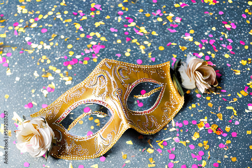 Gold mask for Brazillian carnival with confetti Generative AI techlonology 