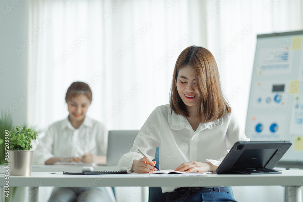 Friends of asia female employee worker discussing and accountant checking data document for investigation of corruption account. Anti Bribery concept, great business conversations