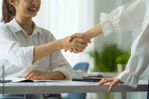 Friends of asia female employee worker discussing and accountant checking data document for investigation of corruption account. Anti Bribery concept, great business conversations