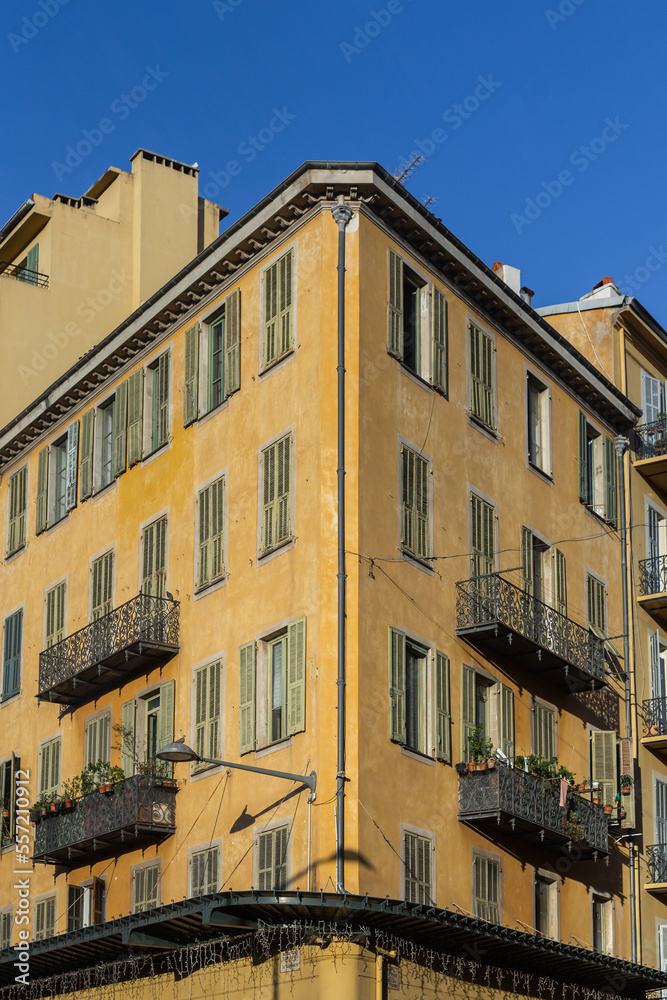 Front of a french yellow building