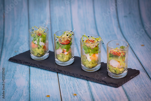 Avocado shrimp arugula mayonaise, espelette pepper and lemon, leek sprouts recipe, High quality photo photo