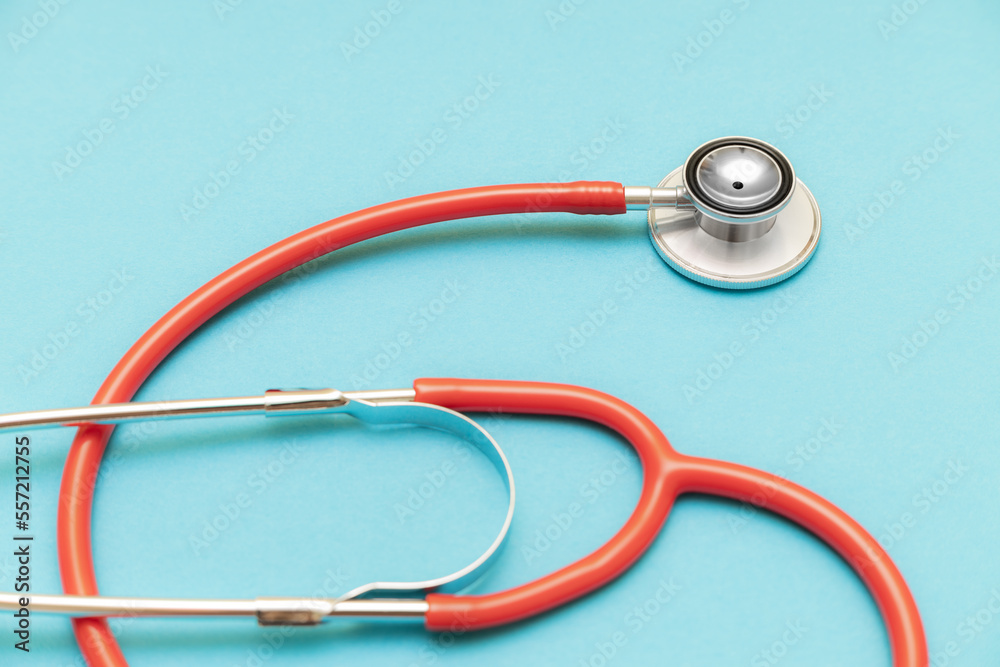 medical stethoscope on a blue background shot with blur. medical stethoscope on a blue background shot with blur.