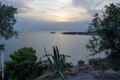 Sunset on the beach Agios Ioannis Beach , Greece photo