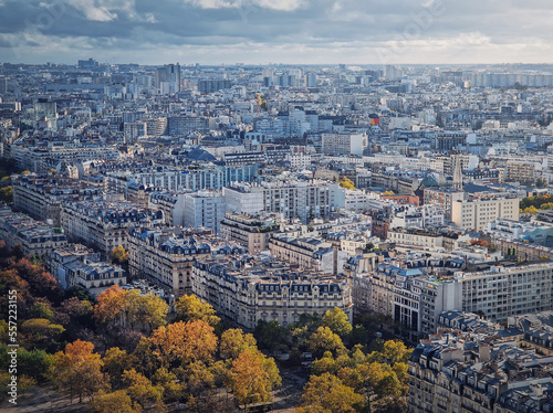 Paris cityscape view from the Eiffel tower height, France. Fall season scene with colored trees © psychoshadow
