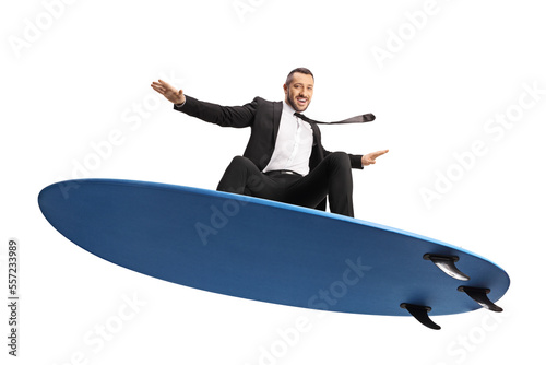 Photography Businessman surfing on a surfboard