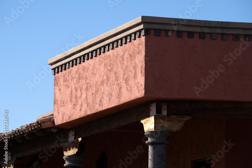 A western style stucco building wall